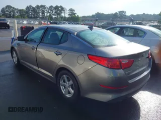 2015 Kia Optima LX z VIN 5XXGM4A70FG393771, wystawiony jako IAAI lot #42273627 z przebiegiem 235 902 mil mil oraz . Historia ofert i sprzedaży dostępna na DreamBid. Obrazek 3.