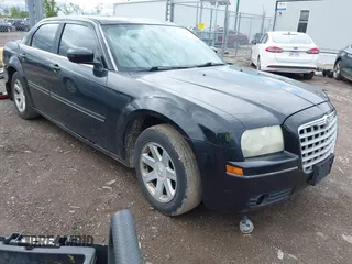 2005 Chrysler 300 Touring with VIN 2C3AA53G85H155393, listed as a IAAI auction lot 42171752 with 225,385 mi miles and . Bid and sale history available at DreamBid. Image 1.