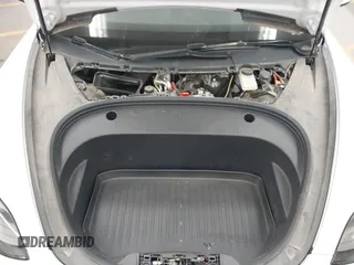 2023 Tesla Model 3 Long Range with VIN 5YJ3E1EB3PF603955, listed as a IAAI auction lot 41915541 with 33,691 mi miles and . Bid and sale history available at DreamBid. Image 10.