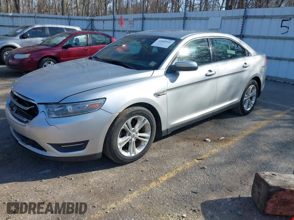 2013 Ford Taurus SEL with VIN 1FAHP2E8XDG191132, listed as a IAAI auction lot 41833542 with 165,125 mi miles. Bid and sale history available at carsss.com. Image 2.
