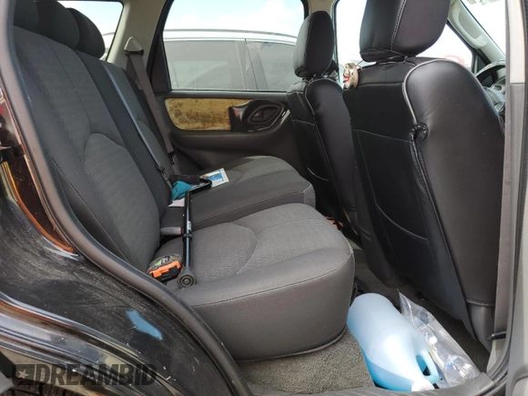 2005 Mazda Tribute i with VIN 4F2YZ02Z05KM51509, listed as a Copart auction lot 75985994 with Not Provided miles and Salvage Title. Bid and sale history available at carsss.com. Image 11.