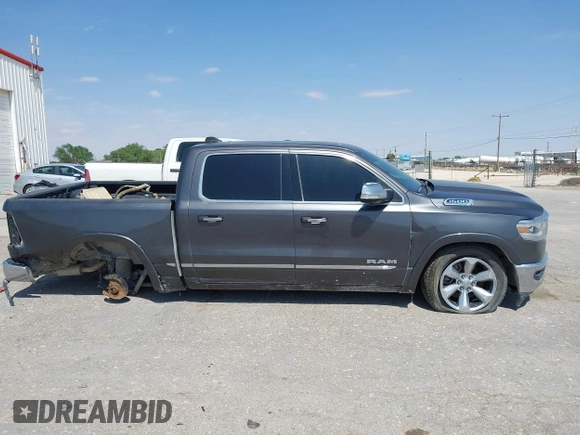 2021 Ram 1500 Limited with VIN 1C6SRFHT8MN640179, listed as a IAAI auction lot 41976594 with 91,756 mi miles and . Bid and sale history available at DreamBid. Image 13.