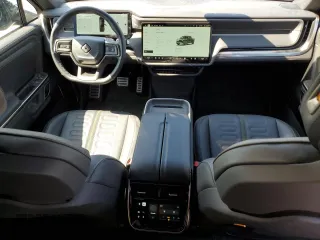 2023 Rivian R1T Adventure z VIN 7FCTGBAA6PN029702, wystawiony jako Copart lot #49833425 z przebiegiem 6608 mil mil oraz Szkody całkowita. Historia ofert i sprzedaży dostępna na DreamBid. Obrazek 8.