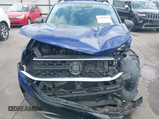 2023 Volkswagen Taos S z VIN 3VVDX7B22PM328971, wystawiony jako IAAI lot #41964869 z przebiegiem 56 683 mil mil oraz . Historia ofert i sprzedaży dostępna na DreamBid. Obrazek 13.