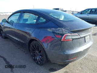 2021 Tesla Model 3 Performance with VIN 5YJ3E1EC3MF082532, listed as a IAAI auction lot 41757905 with 60,431 mi miles and . Bid and sale history available at DreamBid. Image 3.