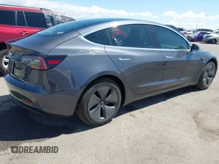 2019 Tesla Model 3 Long Range with VIN 5YJ3E1EB9KF386047, listed as a IAAI auction lot 42215362 with 41,246 mi miles and . Bid and sale history available at DreamBid. Image 4.