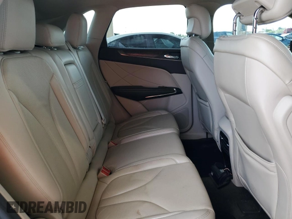 2017 Lincoln MKC Reserve with VIN 5LMCJ3C99HUL14684, listed as a Copart auction lot 58817385 with 77,005 mi miles and Salvage title. Bid and sale history available at DreamBid. Image 11.