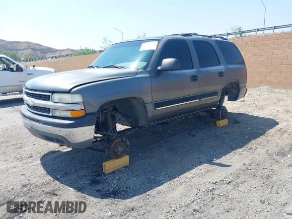 2001 Chevrolet Tahoe LS z VIN 1GNEC13T51J153677, wystawiony jako IAAI lot #42459552 z przebiegiem 201 209 mil mil oraz . Historia ofert i sprzedaży dostępna na DreamBid. Obrazek 17.