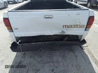 1999 Mazda B-Series 2WD Truck SX with VIN 4F4YR12C2XTM44471, listed as a IAAI auction lot 39659921 with 274,006 mi miles. Bid and sale history available at carsss.com. Image 6.