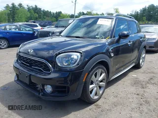 2017 MINI Countryman Cooper S z VIN WMZYT5C39H3D79798, wystawiony jako IAAI lot #42274782 z przebiegiem 96 669 mil mil oraz . Historia ofert i sprzedaży dostępna na DreamBid. Obrazek 2.