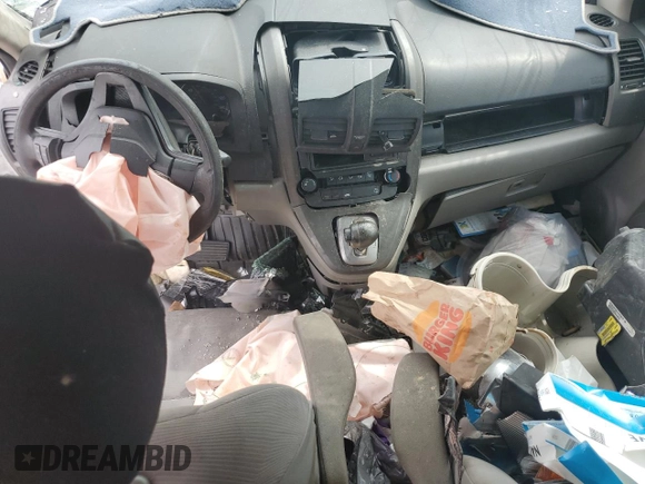 2011 Honda CR-V LX z VIN JHLRE3H30BC006667, wystawiony jako Copart lot #57303885 z przebiegiem Nie podano mil oraz Szkoda całkowita • Salvage title. Historia ofert i sprzedaży dostępna na DreamBid. Obrazek 8.