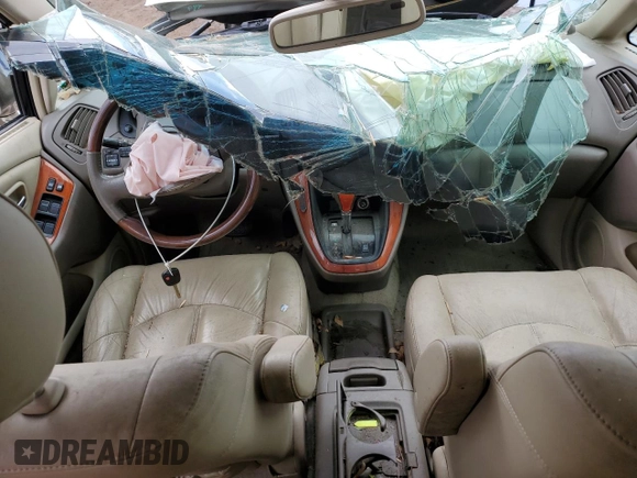 2003 Lexus RX 300 z VIN JTJHF10U030310130, wystawiony jako Copart lot #51695265 z przebiegiem 126 339 mil mil oraz Szkoda całkowita • Salvage title. Historia ofert i sprzedaży dostępna na DreamBid. Obrazek 8.