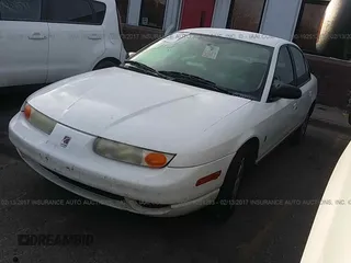 2001 Saturn SL with VIN 1G8ZK52781Z351108, listed as a IAAI auction lot 19251283 with 241,448 mi miles and . Bid and sale history available at DreamBid. Image 2.