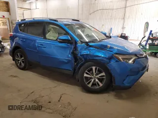 2018 Toyota RAV4 XLE with VIN JTMRFREV2JD234746, listed as a Copart auction lot 52576205 with 0 mi miles and Salvage Title. Bid and sale history available at carsss.com. Image 4.