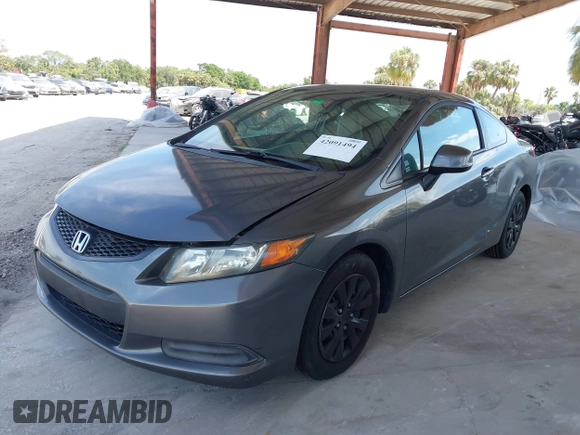 2012 Honda Civic Cpe LX with VIN 2HGFG3B52CH500405, listed as a IAAI auction lot 42091494 with 209,657 mi miles. Bid and sale history available at carsss.com. Image 2.