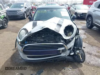 2016 MINI Hardtop 4 Door z VIN WMWXU1C54G2A93779, wystawiony jako IAAI lot #41933339 z przebiegiem 85 000 mil mil oraz . Historia ofert i sprzedaży dostępna na DreamBid. Obrazek 6.
