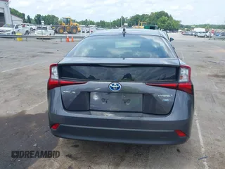 2021 Toyota Prius L Eco z VIN JTDKAMFU3M3152785, wystawiony jako IAAI lot #42501351 z przebiegiem 60 489 mil mil oraz . Historia ofert i sprzedaży dostępna na DreamBid. Obrazek 16.