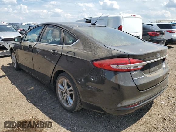 2018 Ford Fusion SE with VIN 3FA6P0HD0JR133698, listed as a Copart auction lot 62895245 with 82,077 mi miles and Salvage title. Bid and sale history available at DreamBid. Image 2.