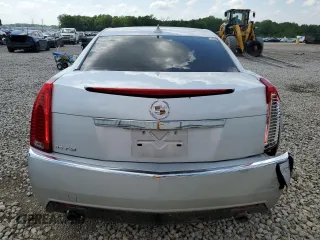 2010 Cadillac CTS z VIN 1G6DA5EG6A0115370, wystawiony jako Copart lot #54919115 z przebiegiem Nie podano mil oraz Szkoda całkowita • Salvage title. Historia ofert i sprzedaży dostępna na DreamBid. Obrazek 6.