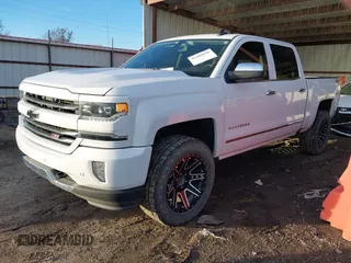 2018 Chevrolet Silverado 1500 LTZ with VIN 3GCUKSEC8JG487892, listed as a IAAI auction lot 41488036 with 142,559 mi miles. Bid and sale history available at carsss.com. Image 2.