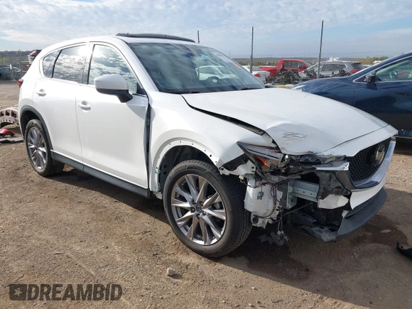 2019 Mazda CX-5 Grand Touring with VIN JM3KFBDM8K0518576, listed as a IAAI auction lot 41854296 with 88,706 mi miles and . Bid and sale history available at carsss.com. Image 1.