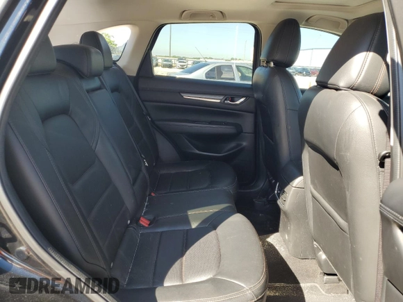 2019 Mazda CX-5 Grand Touring with VIN JM3KFBDM7K0563198, listed as a Copart auction lot 54723494 with 132,126 mi miles and Clean Title. Bid and sale history available at carsss.com. Image 11.