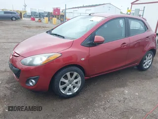 2014 Mazda 2 Touring z VIN JM1DE1LY2E0177294, wystawiony jako IAAI lot #42192006 z przebiegiem 149 668 mil mil oraz . Historia ofert i sprzedaży dostępna na DreamBid. Obrazek 2.