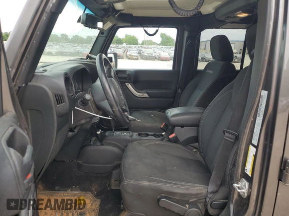 2016 Jeep Wrangler Unlimited Sahara with VIN 1C4BJWEGXGL264740, listed as a Copart auction lot 57225115 with 183,647 mi miles and Salvage title. Bid and sale history available at DreamBid. Image 7.