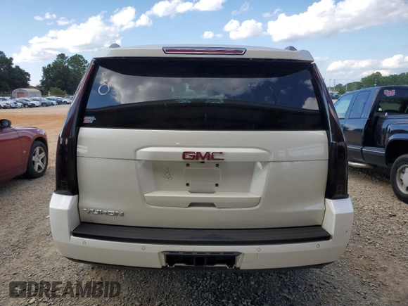 2015 GMC Yukon SLT with VIN 1GKS2BKC1FR736203, listed as a Copart auction lot 67977694 with 178,781 mi miles and Salvage Title. Bid and sale history available at carsss.com. Image 6.