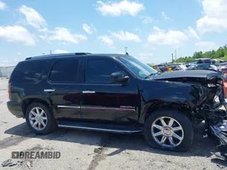 2014 GMC Yukon Denali z VIN 1GKS1EEF0ER217152, wystawiony jako IAAI lot #42269157 z przebiegiem 196 023 mil mil oraz . Historia ofert i sprzedaży dostępna na DreamBid. Obrazek 13.