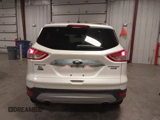 2016 Ford Escape Titanium with VIN 1FMCU9J99GUA61848, listed as a IAAI auction lot 42300324 with 51,692 mi miles and . Bid and sale history available at DreamBid. Image 16.