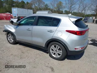 2018 Kia Sportage LX with VIN KNDPM3AC6J7422408, listed as a IAAI auction lot 41918342 with 104,385 mi miles and . Bid and sale history available at carsss.com. Image 3.