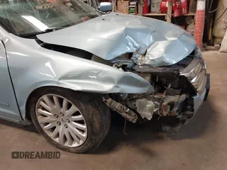 2010 Ford Fusion Hybrid z VIN 3FADP0L34AR276532, wystawiony jako IAAI lot #41491883 z przebiegiem 159 076 mil mil oraz . Historia ofert i sprzedaży dostępna na DreamBid. Obrazek 6.