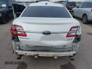 2013 Ford Taurus SEL with VIN 1FAHP2E87DG111530, listed as a IAAI auction lot 41322957 with 183,103 mi miles. Bid and sale history available at carsss.com. Image 6.
