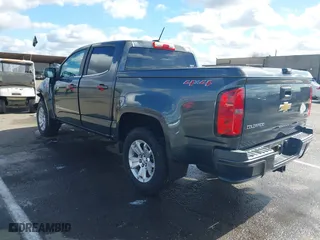 2015 Chevrolet Colorado 4WD LT with VIN 1GCGTBE37F1208139, listed as a IAAI auction lot 41589530 with 105,806 mi miles. Bid and sale history available at carsss.com. Image 3.
