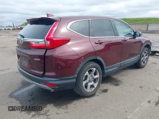 2019 Honda CR-V EX with VIN 7FARW2H56KE053022, listed as a IAAI auction lot 41848570 with 128,676 mi miles. Bid and sale history available at carsss.com. Image 4.