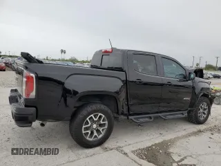 2022 GMC Canyon 4WD AT4 w/Leather with VIN 1GTG6FEN2N1294071, listed as a Copart auction lot 84652954 with 53,076 mi miles and Salvage Title. Bid and sale history available at carsss.com. Image 3.