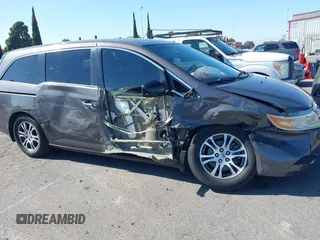 2011 Honda Odyssey EX-L with VIN 5FNRL5H68BB083492, listed as a IAAI auction lot 42087699 with 155,141 mi miles and . Bid and sale history available at carsss.com. Image 6.