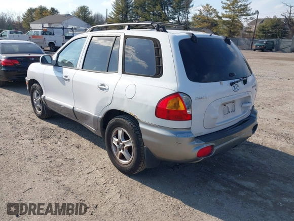 2002 Hyundai Santa Fe GLS with VIN KM8SC73D32U249942, listed as a IAAI auction lot 41660482 with 151,164 mi miles. Bid and sale history available at carsss.com. Image 3.