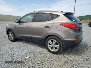 2013 Hyundai Tucson GLS with VIN KM8JU3AC4DU588322, listed as a Copart auction lot 52991475 with 174,335 mi miles and Clean Title. Bid and sale history available at carsss.com. Image 2.