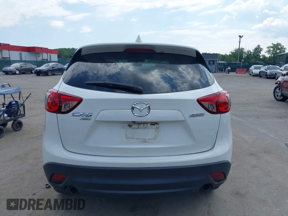 2014 Mazda CX-5 Touring z VIN JM3KE4CY9E0373359, wystawiony jako IAAI lot #42209277 z przebiegiem 106 493 mil mil oraz . Historia ofert i sprzedaży dostępna na DreamBid. Obrazek 17.