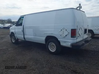 2010 Ford Econoline Cargo Commercial with VIN 1FTNE1EW8ADA91801, listed as a IAAI auction lot 41940231 with 201,516 mi miles and . Bid and sale history available at carsss.com. Image 3.