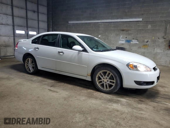 2015 Chevrolet Impala LTZ with VIN 2G1WC5E34F1153228, listed as a Copart auction lot 53814275 with 147,773 mi miles and Salvage Title. Bid and sale history available at DreamBid. Image 4.
