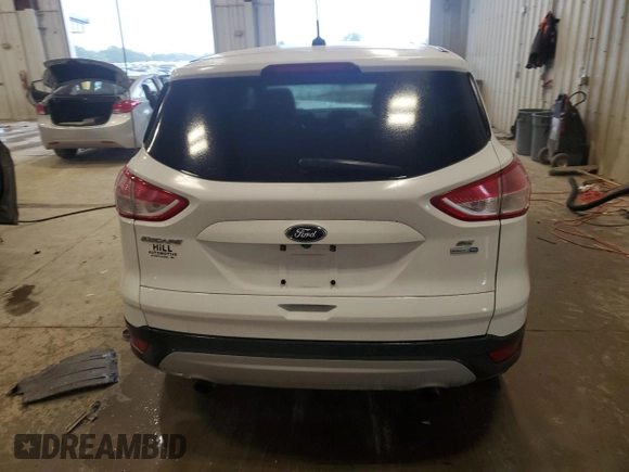 2014 Ford Escape SE with VIN 1FMCU9GX5EUB63568, listed as a Copart auction lot 61221735 with 118,303 mi miles and Non repairable. Bid and sale history available at DreamBid. Image 6.