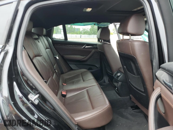 2015 BMW X4 xDrive35i with VIN 5UXXW5C55F0E87384, listed as a Copart auction lot 56299284 with 182,434 mi miles and Clean Title. Bid and sale history available at carsss.com. Image 11.