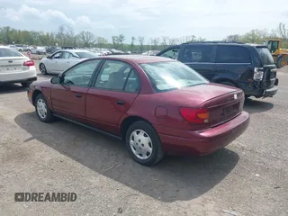 2001 Saturn SL z VIN 1G8ZH52841Z331770, wystawiony jako IAAI lot #42136194 z przebiegiem 70 798 mil mil oraz . Historia ofert i sprzedaży dostępna na DreamBid. Obrazek 3.