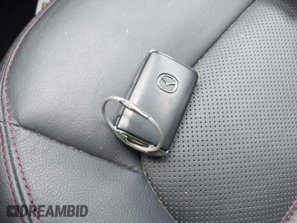 2024 Mazda CX-5 S Carbon Edition with VIN JM3KFBCL3R0505477, listed as a IAAI auction lot 42245851 with 17,954 mi miles and . Bid and sale history available at DreamBid. Image 11.