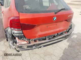 2014 BMW X1 sDrive28i with VIN WBAVM1C50EVW53376, listed as a IAAI auction lot 41838580 with 114,054 mi miles. Bid and sale history available at carsss.com. Image 6.
