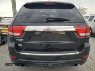2012 Jeep Grand Cherokee Overland with VIN 1C4RJECT7CC311578, listed as a Copart auction lot 51905715 with 172,980 mi miles and Salvage Title. Bid and sale history available at carsss.com. Image 6.