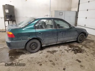 1999 Honda Civic VP z VIN 2HGEJ6611XH594868, wystawiony jako Copart lot #45193835 z przebiegiem 180 914 mil mil oraz Szkoda całkowita • Salvage title. Historia ofert i sprzedaży dostępna na DreamBid. Obrazek 3.